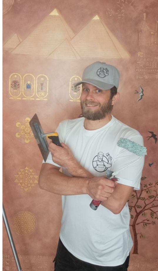 Es stāvu baltajā darba terpa